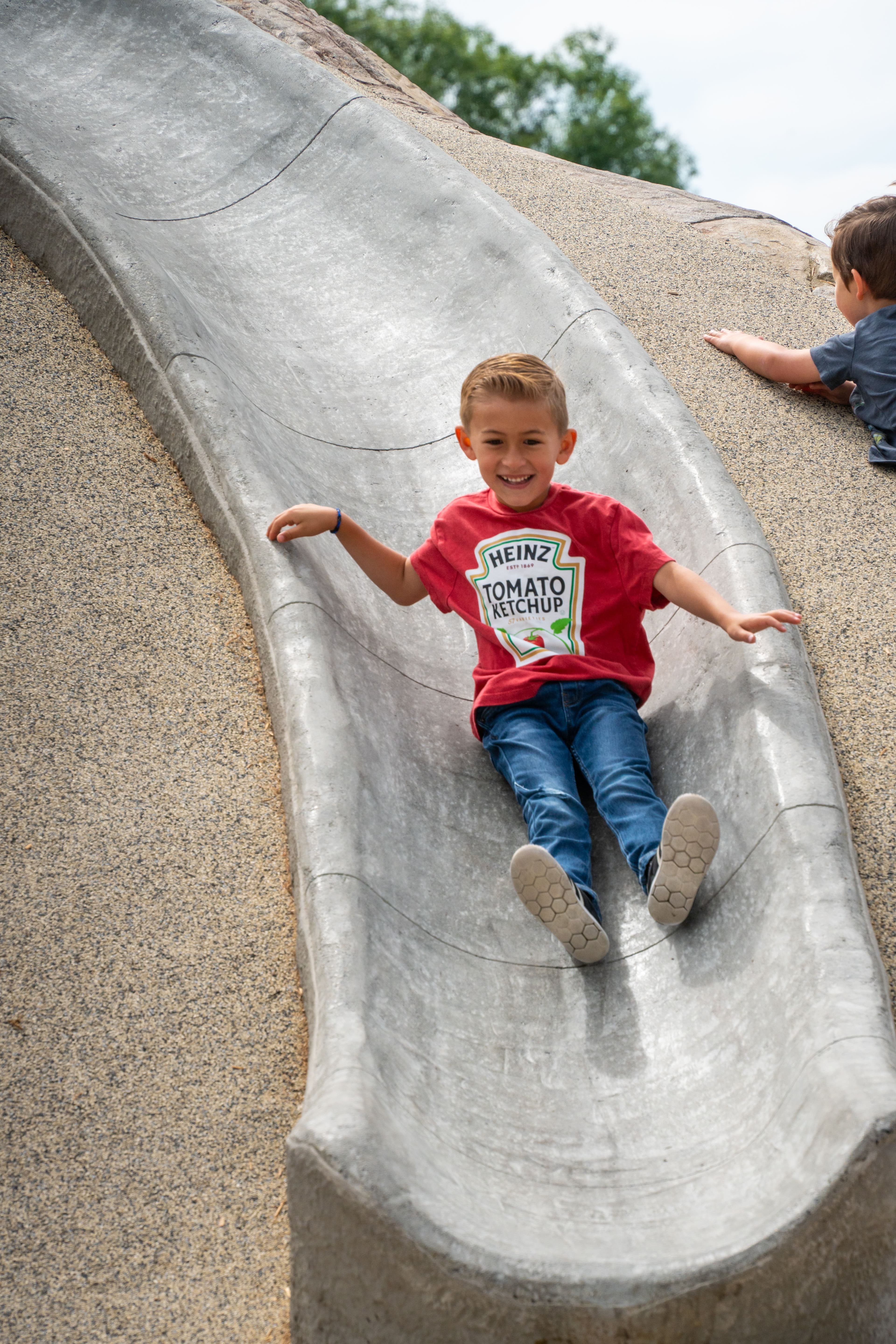Embankment slide built into a mound by Westplay