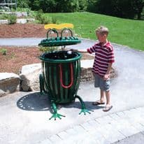 Themed waste receptacle and site amenities installed in a community park