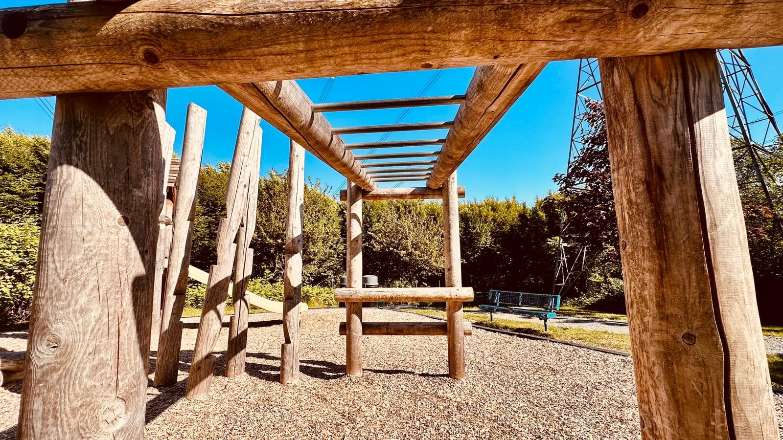 Wooden playground structure by Westplay