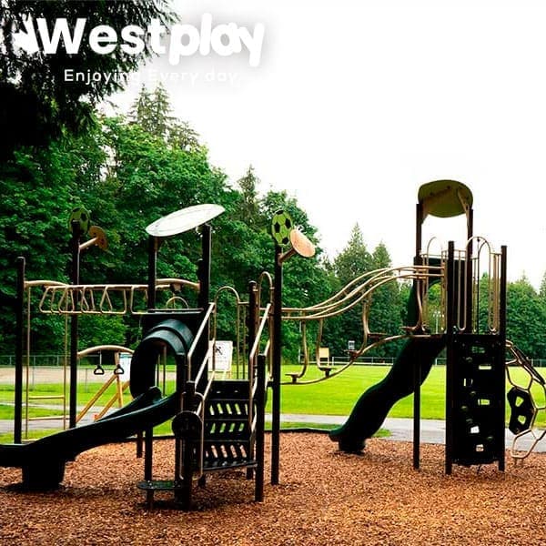 Completed municipal park with play structure and safety surfacing